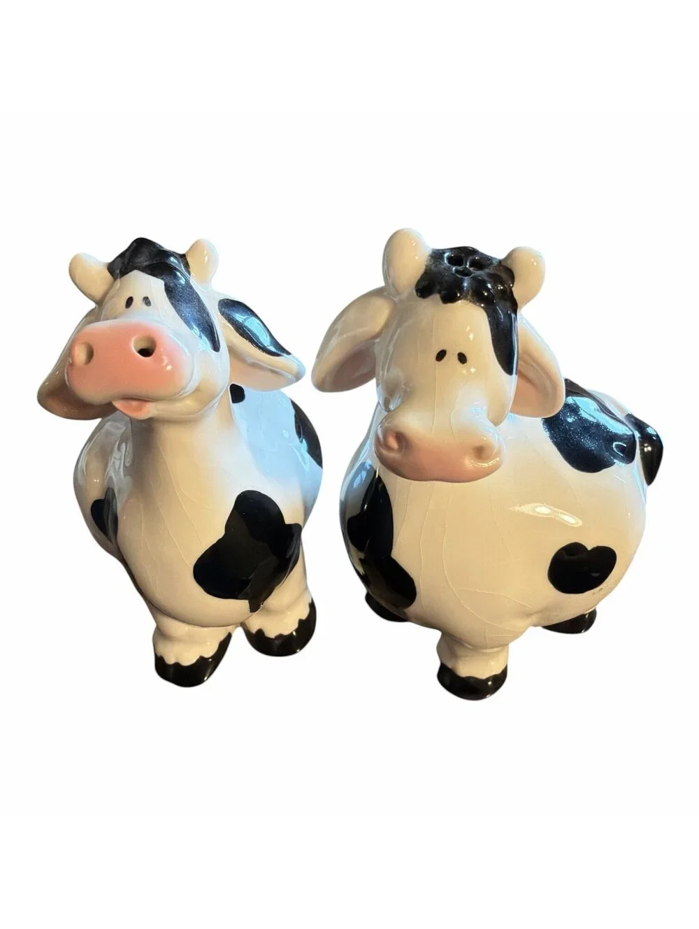 Salt and pepper cow shakers
